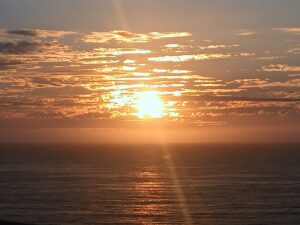 sun setting over the ocean